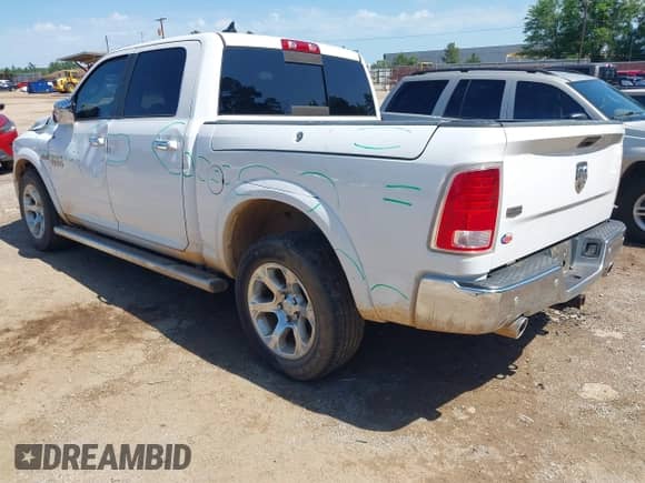 2016 Ram 1500 Laramie with VIN 1C6RR6NT5GS403500, listed as a IAAI auction lot 42207272 with 134,456 mi miles and . Bid and sale history available at DreamBid. Image 3.