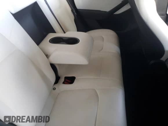 2021 Tesla Model Y Long Range with VIN 5YJYGDEE7MF206059, listed as a Copart auction lot 80559965 with 77,329 mi miles and Salvage title. Bid and sale history available at DreamBid. Image 10.