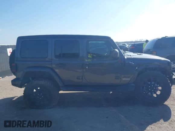 2021 Jeep Wrangler Unlimited Sahara Altitude z VIN 1C4HJXEN9MW618188, wystawiony jako IAAI lot #41674142 z przebiegiem 66 302 mil mil oraz . Historia ofert i sprzedaży dostępna na DreamBid. Obrazek 14.