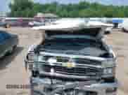 2014 Chevrolet Silverado 1500 LT z VIN 3GCUKREC2EG501235, wystawiony jako IAAI lot #42715436 z przebiegiem 164 781 mil mil oraz . Historia ofert i sprzedaży dostępna na DreamBid. Obrazek 10.