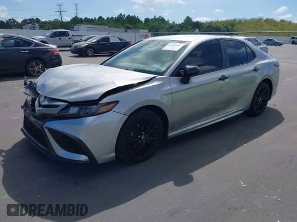 2021 Toyota Camry SE with VIN 4T1G11AK2MU445593, listed as a IAAI auction lot 43385464 with 57,907 mi miles and . Bid and sale history available at DreamBid. Image 2.