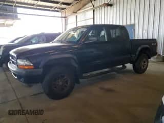 2003 Dodge Dakota Sport with VIN 1D7HG38N03S288682, listed as a Copart auction lot 64330595 with 147,258 mi miles and Clean title. Bid and sale history available at DreamBid. Image 1.
