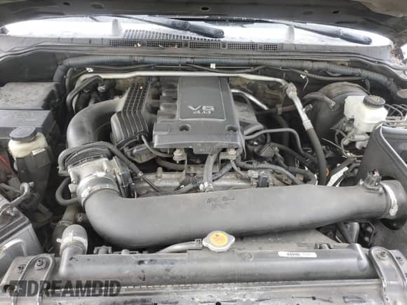 2005 Nissan Frontier SE z VIN 1N6AD07W55C430709, wystawiony jako Copart lot #49446725 z przebiegiem 233 907 mil mil oraz Szkoda całkowita • Salvage title. Historia ofert i sprzedaży dostępna na DreamBid. Obrazek 11.