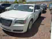 2014 Chrysler 300 S with VIN 2C3CCABG0EH330345, listed as a IAAI auction lot 42164999 with 167,627 mi miles and . Bid and sale history available at DreamBid. Image 2.