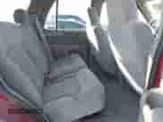 1999 Chevrolet Blazer LT with VIN 1GNCS13WXX2197052, listed as a IAAI auction lot 40851811 with 140,060 mi miles and . Bid and sale history available at DreamBid. Image 8.