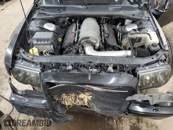 2006 Chrysler 300 C SRT-8 z VIN 2C3LA73W86H340377, wystawiony jako Copart lot #68520435 z przebiegiem 97 573 mil mil oraz Szkoda całkowita • Salvage title. Historia ofert i sprzedaży dostępna na DreamBid. Obrazek 11.