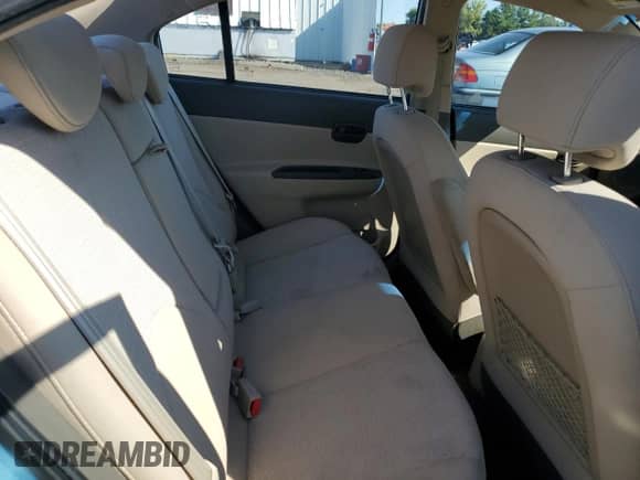 2009 Hyundai Accent Auto GLS z VIN KMHCN46CX9U333847, wystawiony jako Copart lot #69383775 z przebiegiem 144 793 mil mil oraz Szkoda całkowita • Salvage title. Historia ofert i sprzedaży dostępna na DreamBid. Obrazek 10.