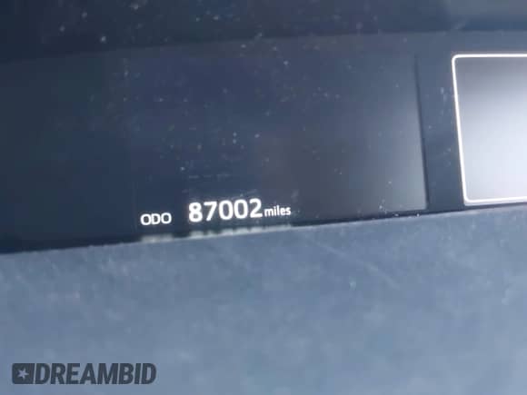 2021 Toyota Prius L Eco with VIN JTDKAMFUXM3143243, listed as a IAAI auction lot 43079577 with 87,002 mi miles and . Bid and sale history available at DreamBid. Image 14.