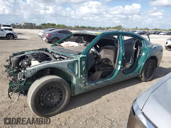 2021 Dodge Charger Police with VIN 2C3CDXKG1MH595712, listed as a Copart auction lot 54206025 with Not provided miles and Clean title. Bid and sale history available at DreamBid. Image 1.