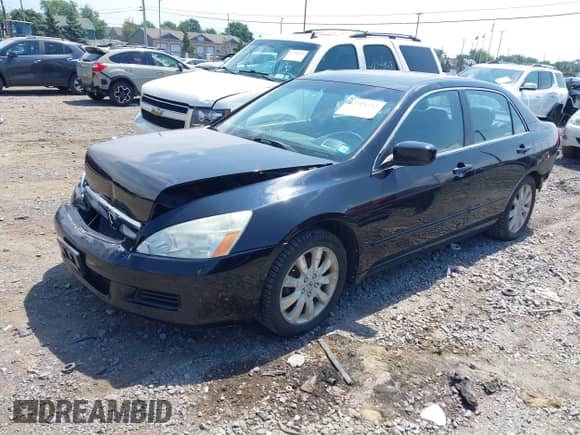 2007 Honda Accord EX-L with VIN 1HGCM665X7A087340, listed as a IAAI auction lot 42735732 with 140,374 mi miles and . Bid and sale history available at DreamBid. Image 2.