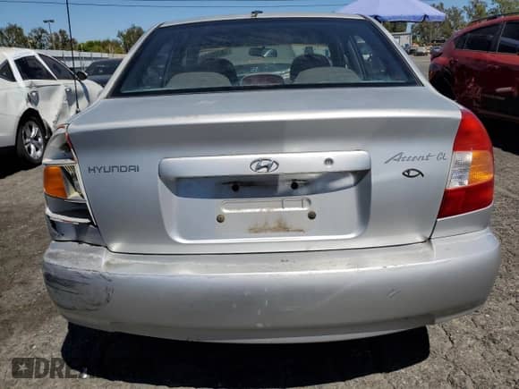 2002 Hyundai Accent GL с VIN KMHCG45C92U353198, выставлен на аукционе Copart как лот 68305654 с пробегом 130 594 миль миль и Чистый • Clean title. История ставок и продаж доступна на DreamBid. Изображение 6.