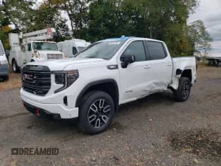 2025 GMC Sierra 1500 AT4 with VIN 1GTUUEE88SZ254846, listed as a Copart auction lot 90012235 with 3,709 mi miles and Salvage title. Bid and sale history available at DreamBid. Image 1.