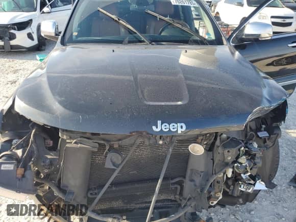 2012 Jeep Grand Cherokee Overland Summit z VIN 1C4RJFCT1CC270449, wystawiony jako Copart lot #70261785 z przebiegiem 143 572 mil mil oraz Czysty tytuł • Clean title. Historia ofert i sprzedaży dostępna na DreamBid. Obrazek 12.