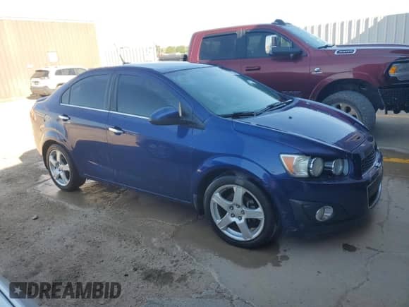 2013 Chevrolet Sonic LTZ with VIN 1G1JE5SHXD4119719, listed as a Copart auction lot 67856545 with 82,097 mi miles and Clean title. Bid and sale history available at DreamBid. Image 4.