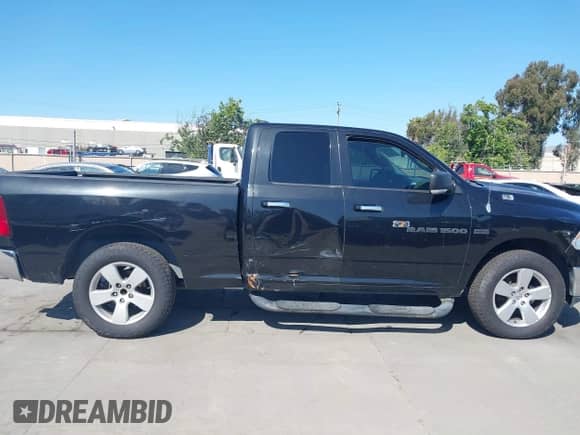 2011 Ram 1500 Big Horn z VIN 1D7RB1GT9BS570275, wystawiony jako IAAI lot #42142671 z przebiegiem 209 231 mil mil oraz . Historia ofert i sprzedaży dostępna na DreamBid. Obrazek 13.