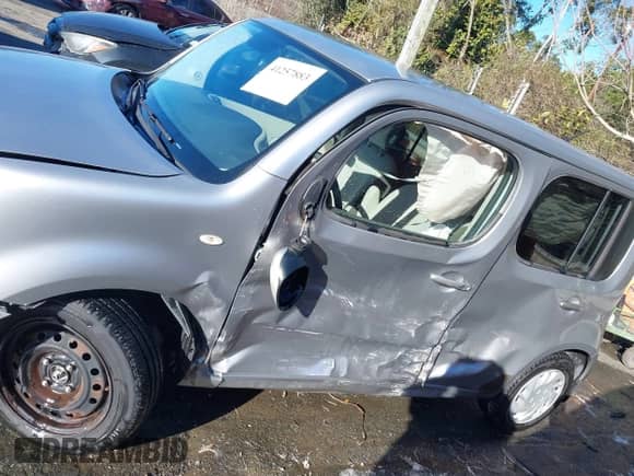 2009 Nissan Cube 1.8 Base with VIN JN8AZ28R29T121668, listed as a IAAI auction lot 41257883 with 154,833 mi miles and . Bid and sale history available at DreamBid. Image 14.