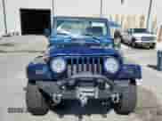2003 Jeep Wrangler X z VIN 1J4FA39S73P355010, wystawiony jako Copart lot #86589105 z przebiegiem 126 492 mil mil oraz Szkoda całkowita • Salvage title. Historia ofert i sprzedaży dostępna na DreamBid. Obrazek 5.