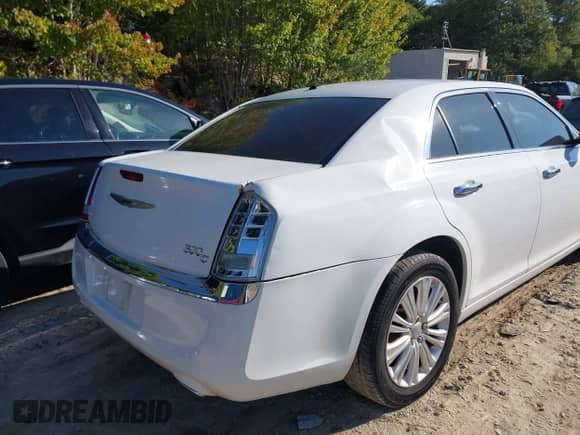 2013 Chrysler 300 C with VIN 2C3CCAKT5DH533288, listed as a IAAI auction lot 43180215 with 124,265 mi miles and . Bid and sale history available at DreamBid. Image 6.