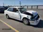 2003 Hyundai Accent GL z VIN KMHCG45C73U427901, wystawiony jako Copart lot #63874575 z przebiegiem 134 268 mil mil oraz Szkoda całkowita • Salvage title. Historia ofert i sprzedaży dostępna na DreamBid. Obrazek 4.