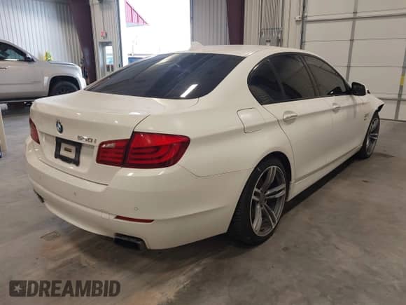 2011 BMW 5 Series 550i xDrive with VIN WBAFU9C56BC784595, listed as a IAAI auction lot 43006877 with 136,472 mi miles and . Bid and sale history available at DreamBid. Image 4.