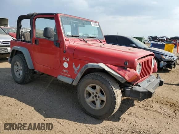 2003 Jeep Wrangler X z VIN 1J4FA39S33P308881, wystawiony jako Copart lot #69323655 z przebiegiem 264 257 mil mil oraz Szkoda całkowita • Salvage title. Historia ofert i sprzedaży dostępna na DreamBid. Obrazek 4.