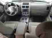 2010 Dodge Nitro SE with VIN 1D4PU2GK4AW126658, listed as a Copart auction lot 62361795 with 127,699 mi miles and Salvage title. Bid and sale history available at DreamBid. Image 8.