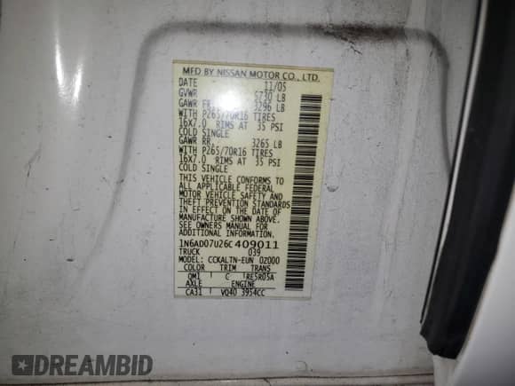 2006 Nissan Frontier SE with VIN 1N6AD07U26C409011, listed as a Copart auction lot 81084965 with 180,655 mi miles and Salvage title. Bid and sale history available at DreamBid. Image 12.