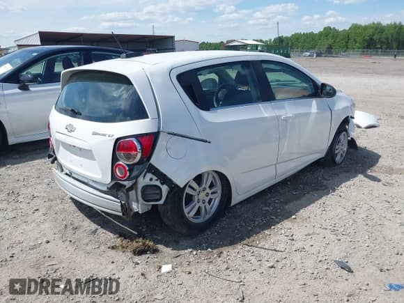 2016 Chevrolet Sonic LT with VIN 1G1JC6SH2G4106723, listed as a IAAI auction lot 42196780 with 107,275 mi miles and . Bid and sale history available at DreamBid. Image 4.