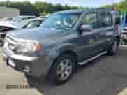 2010 Honda Pilot Touring with VIN 5FNYF4H9XAB005981, listed as a Copart auction lot 71617615 with 183,441 mi miles and Salvage title. Bid and sale history available at DreamBid. Image 1.