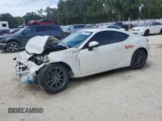 2015 Scion FR-S z VIN JF1ZNAA10F9709530, wystawiony jako Copart lot #84758925 z przebiegiem 77 729 mil mil oraz Szkoda całkowita • Salvage title. Historia ofert i sprzedaży dostępna na DreamBid. Obrazek 1.