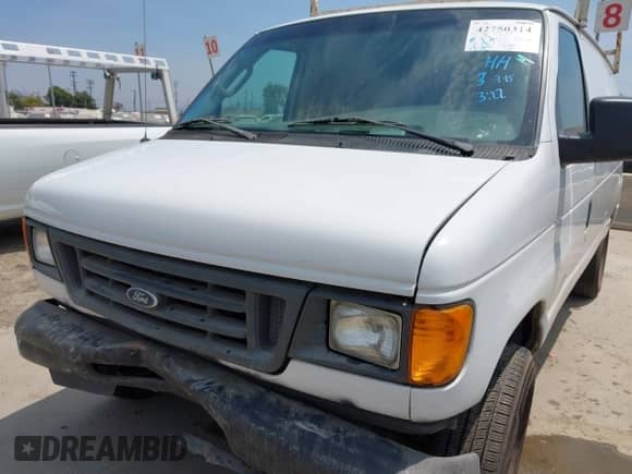 2004 Ford Econoline Cargo with VIN 1FTNE24L34HB22513, listed as a IAAI auction lot 42750314 with 221,334 mi miles and . Bid and sale history available at DreamBid. Image 6.