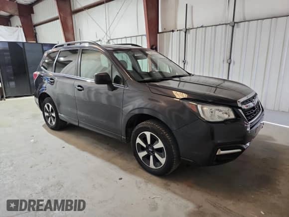 2018 Subaru Forester Premium z VIN JF2SJAGC0JH521624, wystawiony jako Copart lot #84973705 z przebiegiem 68 558 mil mil oraz Czysty tytuł • Clean title. Historia ofert i sprzedaży dostępna na DreamBid. Obrazek 4.