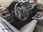 2021 Chevrolet Suburban LS z VIN 1GNSKBET3MR468122, wystawiony jako Copart lot #54248805 z przebiegiem Nie podano mil oraz Szkoda całkowita • Salvage title. Historia ofert i sprzedaży dostępna na DreamBid. Obrazek 8.