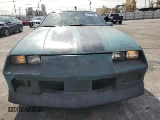 1991 Chevrolet Camaro RS z VIN 1G1FP23E1ML109699, wystawiony jako Copart lot #72436524 z przebiegiem 199 915 mil mil oraz Czysty tytuł • Clean title. Historia ofert i sprzedaży dostępna na DreamBid. Obrazek 5.
