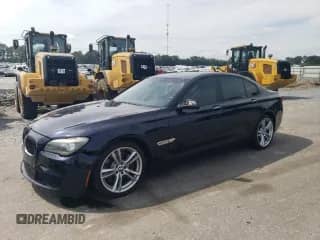 2011 BMW 7 Series 750i with VIN WBAKA8C58BCY36925, listed as a Copart auction lot 69639325 with 143,247 mi miles and Salvage title. Bid and sale history available at DreamBid. Image 1.
