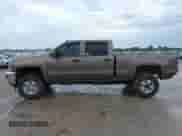2015 Chevrolet Silverado 2500HD LT z VIN 1GC1KVEG0FF131663, wystawiony jako IAAI lot #42117911 z przebiegiem 144 511 mil mil oraz . Historia ofert i sprzedaży dostępna na DreamBid. Obrazek 14.