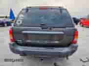 2004 Jeep Grand Cherokee Laredo with VIN 1J4GW48S84C361744, listed as a Copart auction lot 91091115 with 236,095 mi miles and Clean title. Bid and sale history available at DreamBid. Image 6.