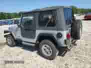 2002 Jeep Wrangler X with VIN 1J4FA39S02P750998, listed as a Copart auction lot 66619075 with 98,985 mi miles and Clean title. Bid and sale history available at DreamBid. Image 2.