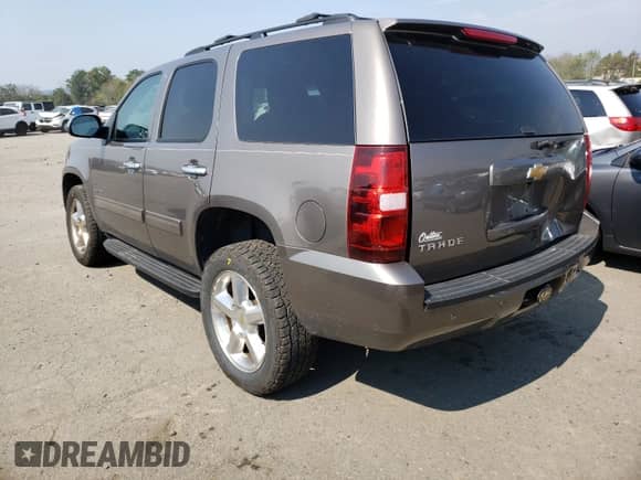 2013 Chevrolet Tahoe LS with VIN 1GNSKAE01DR202100, listed as a Copart auction lot 57896221 with 107,509 mi miles and Salvage title. Bid and sale history available at DreamBid. Image 3.