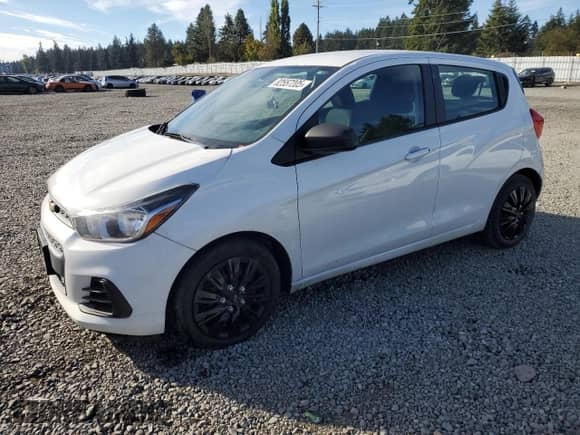 2016 Chevrolet Spark LS with VIN KL8CB6SAXGC585221, listed as a Copart auction lot 82557205 with 65,674 mi miles and Salvage title. Bid and sale history available at DreamBid. Image 1.