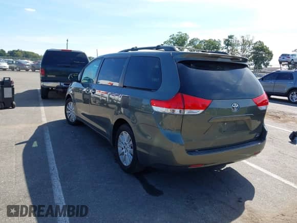 2012 Toyota Sienna LE with VIN 5TDJK3DC5CS035008, listed as a IAAI auction lot 43379412 with 238,613 mi miles and . Bid and sale history available at DreamBid. Image 3.