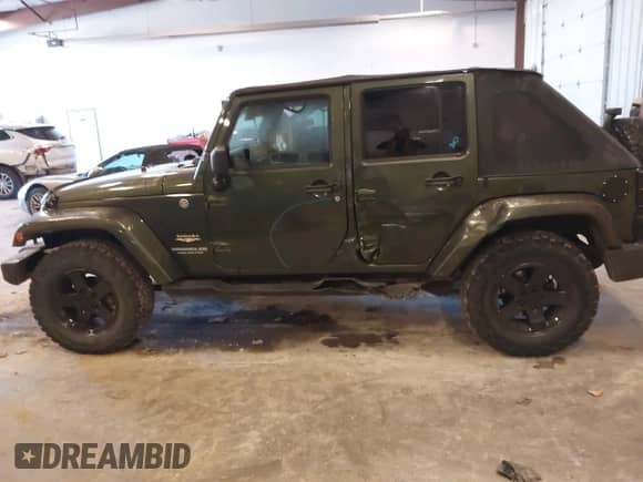 2007 Jeep Wrangler Unlimited Sahara с VIN 1J4GA59137L141913, выставлен на аукционе IAAI как лот 43370589 с пробегом 136 655 миль миль и . История ставок и продаж доступна на DreamBid. Изображение 14.
