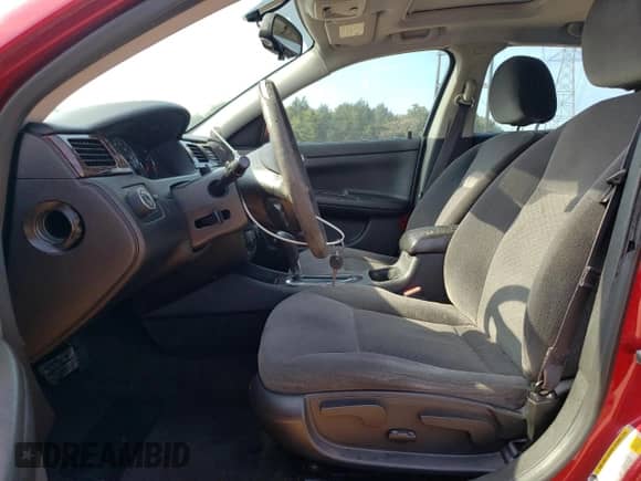 2015 Chevrolet Impala LT with VIN 2G1WB5E37F1116774, listed as a Copart auction lot 81469305 with 198,468 mi miles and Salvage title. Bid and sale history available at DreamBid. Image 7.