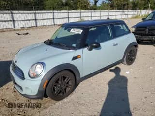 2012 MINI Hardtop with VIN WMWSU3C54CT257698, listed as a Copart auction lot 74214794 with 142,273 mi miles and Salvage title. Bid and sale history available at DreamBid. Image 1.