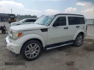 2010 Dodge Nitro Heat with VIN 1D4PT4GK3AW173808, listed as a Copart auction lot 63020014 with 208,358 mi miles and Salvage title. Bid and sale history available at DreamBid. Image 1.