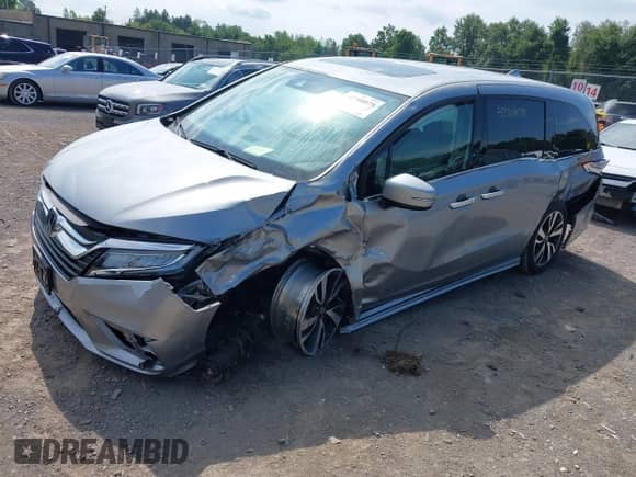 2018 Honda Odyssey Elite z VIN 5FNRL6H99JB070314, wystawiony jako IAAI lot #42708078 z przebiegiem Nie podano mil oraz . Historia ofert i sprzedaży dostępna na DreamBid. Obrazek 2.