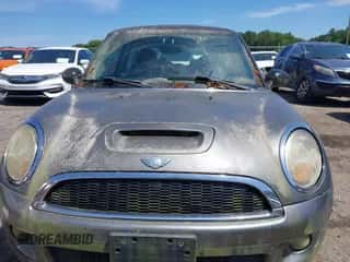 2009 MINI Hardtop S with VIN WMWMF73579TT96047, listed as a IAAI auction lot 42294180 with 109,331 mi miles and . Bid and sale history available at DreamBid. Image 6.