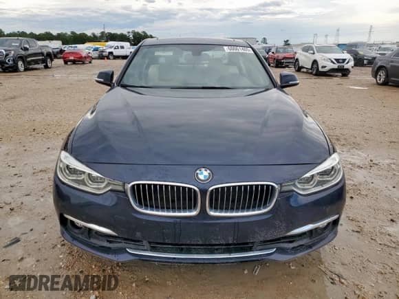 2017 BMW 3 Series 330i with VIN WBA8B9C58HK676220, listed as a Copart auction lot 60061405 with 55,577 mi miles and Salvage title. Bid and sale history available at DreamBid. Image 5.