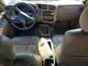 2000 Chevrolet Blazer LT с VIN 1GNCS13W3Y2339906, выставлен на аукционе Copart как лот 54995215 с пробегом 144 114 миль миль и Списание • Salvage title. История ставок и продаж доступна на DreamBid. Изображение 8.