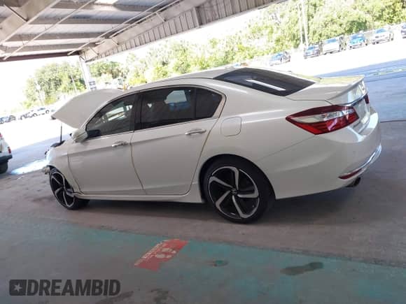 2017 Honda Accord Touring with VIN 1HGCR3F93HA036119, listed as a IAAI auction lot 42817715 with 102,114 mi miles and . Bid and sale history available at DreamBid. Image 14.